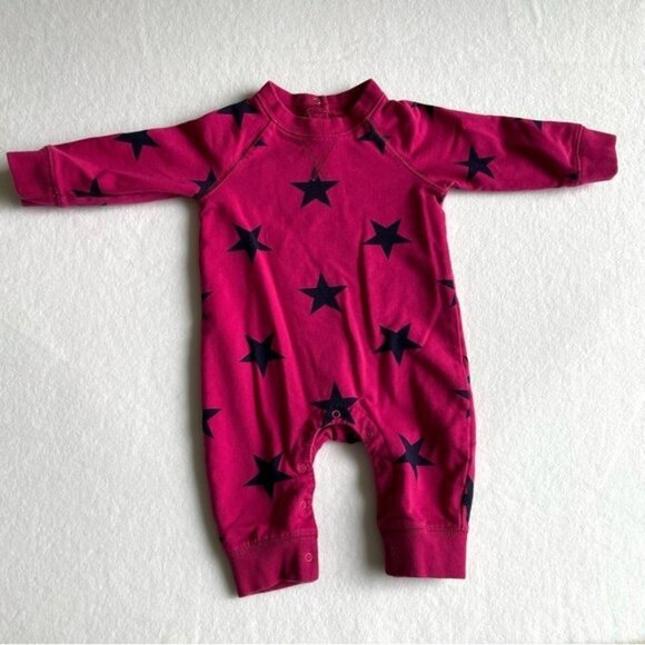 Primary Magenta Star Print Footie - Picture 1 of 5